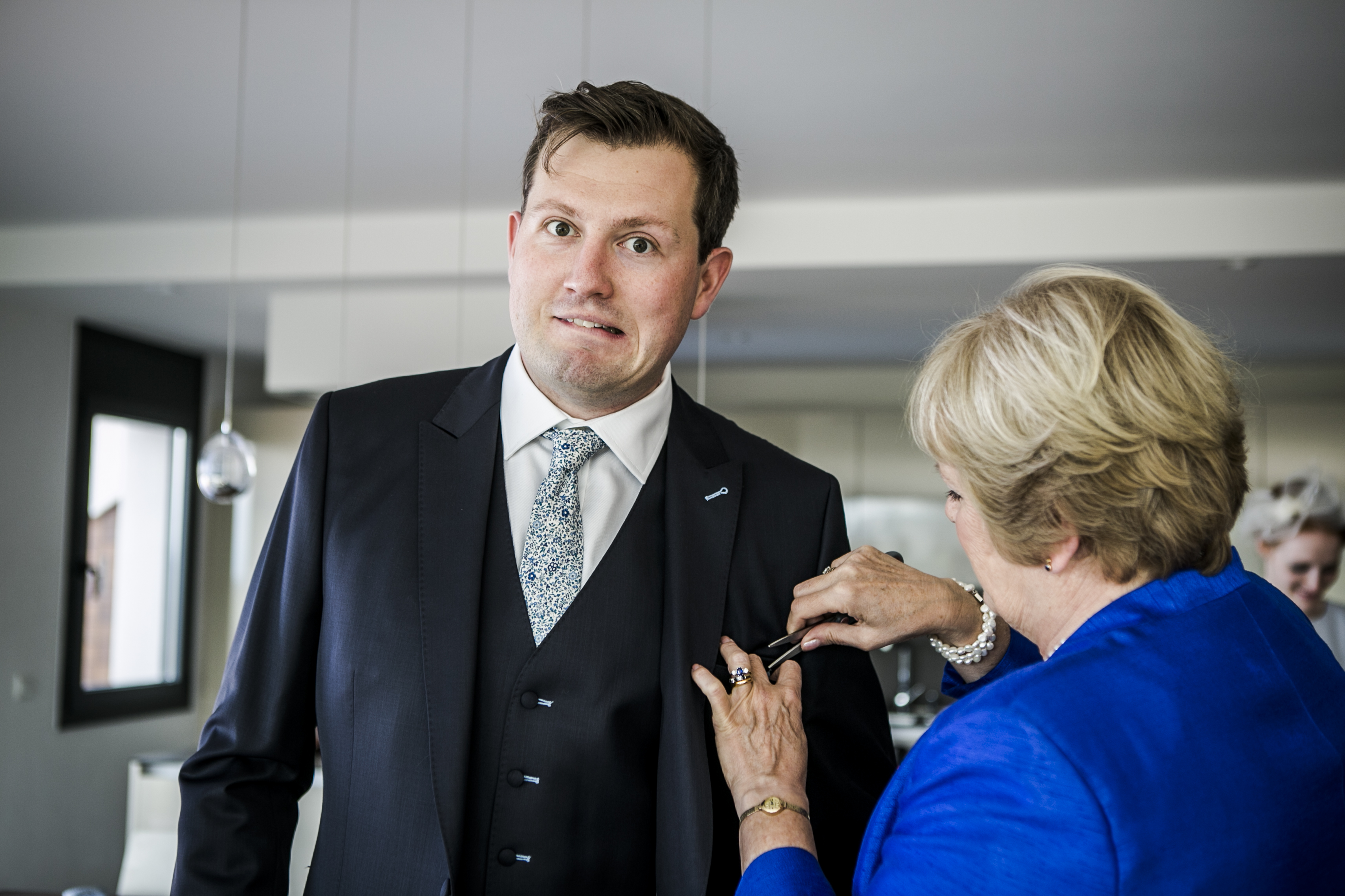 Grooms preparation at wedding grooms getting to the ceremony