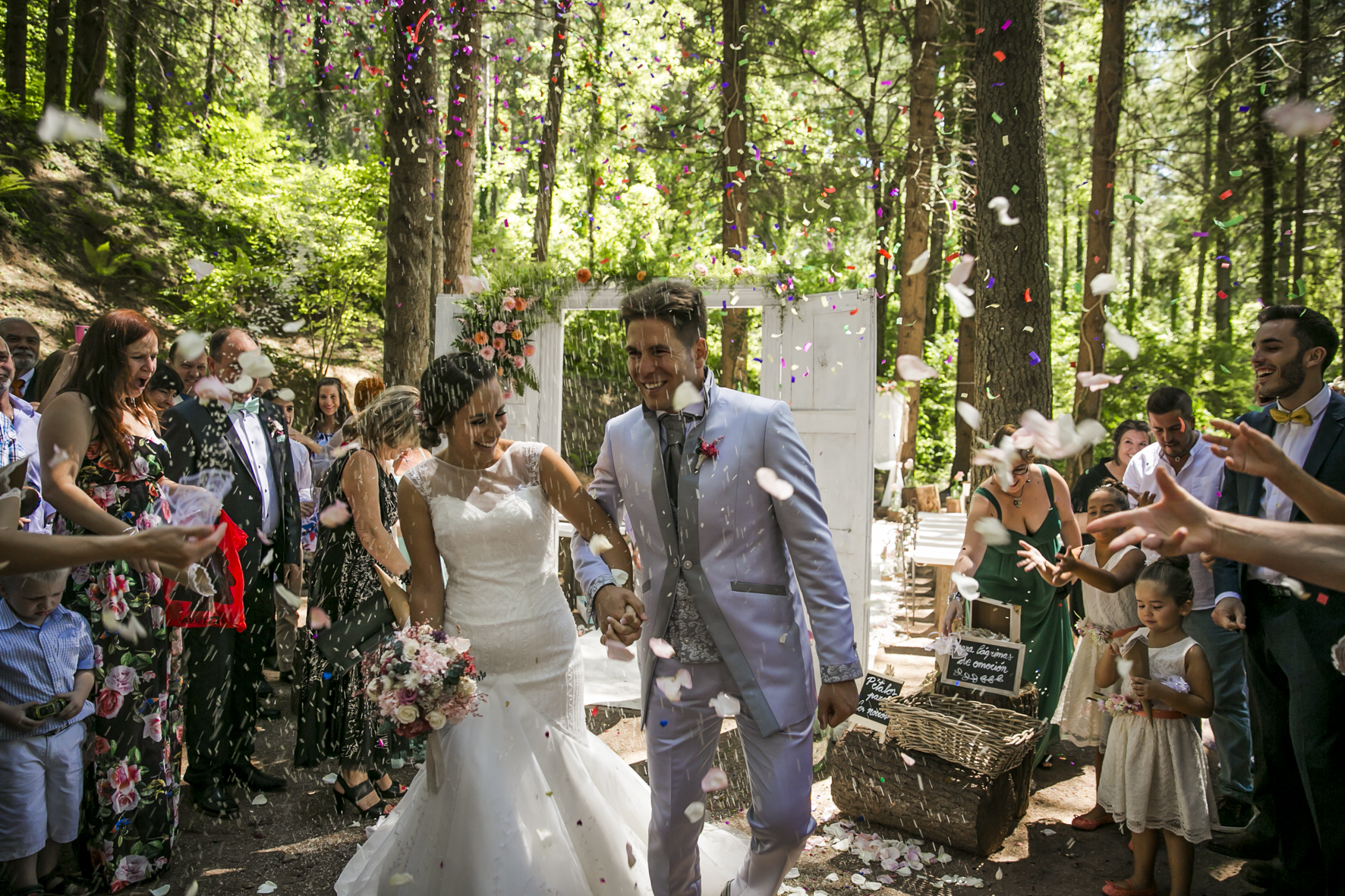 the newly weds exiting the ceremony in mas del silenci